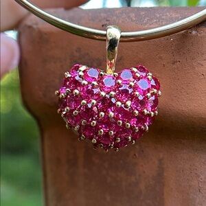 14 Karat Yellow Gold Heart Pendant with synthetic rubies pendant